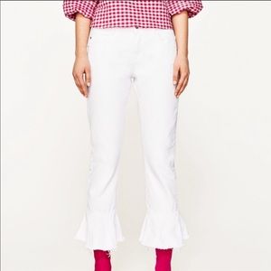 white jeans with little flare at the bottom
